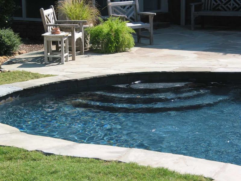 Swimming pool with underwater steps in the shallow end.